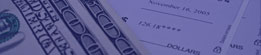 Photo of Money and Checks